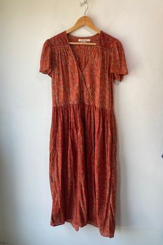 Christy Dawn Rust Floral Dress in excellent condition. Size L, 100% cotton. Machine wash cold, line dry. Tiny bit sheer! Such a lovely lightweight feel. Wonderful prancing through a prairie vibe. Flattering cut. Just perfect Approx. Measurements: Length: 52" Waist: 19" laid flat across Underarm to underarm: 20" Summer Bohemian Flowy Prairie Dress, Bohemian Flowy Prairie Dress For Summer, Bohemian Flowy Prairie Summer Dress, Casual Cotton Voile Dresses For Daywear, Flowy Bohemian Peasant Dress For Daywear, Bohemian Maxi Length Cotton Voile Dress, Bohemian Maxi Dress In Cotton Voile, Spring Prairie Style Cotton Dress, Bohemian Prairie Midi Length Dress For Summer