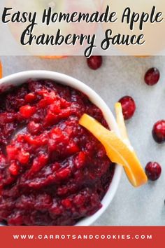 cranberry sauce in a white bowl with orange slices on the side and text overlay that reads easy homemade apple cranberry sauce