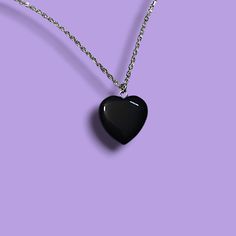 "This black heart necklace screams 90s goth / grunge vibes. Perfect for all day wear and into the night. The black obsidian heart rests on a 24 inch stainless steel chain. A simple but fashionable piece of gothic style jewelry. Makes for an excellent gift for her! * Necklace chain is made of stainless steel  and is 24\" long. It sits at about center chest. * Black heart obsidian center stone. * Ships out within 3 business days from the US. For more goth, grunge, and punk style necklaces or jewelry, check out the rest of my shop at www.etsy.com/shop/QuirkyKorner - Shipping - * Item(s) will ship out within 3 business days. * Business days are Monday through Friday (excluding US Holidays). * US shipping only." Edgy Black Necklaces For Gift, Edgy Black Necklace For Gift, Edgy Black Necklaces For Gifts, Edgy Black Necklace As Gift, Emo Necklace For Valentine's Day Gift, Emo Style Necklace For Valentine's Day Gift, Emo Heart-shaped Jewelry Gift, Black Grunge Necklace For Gift, Punk Heart Necklace As A Gift