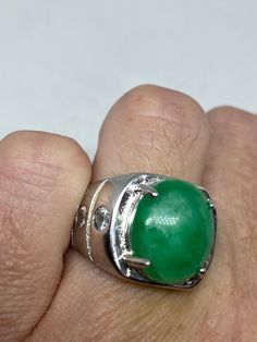 Vintage Lucky Green Nephrite Jade ring Large green nephrite jade Ornate German Silver Vintage ring, does not tarnish, NOT sterling Sizes 7 My jeweler can custom re size for a $10-$20 fee All rings are shipped free in the US in a nice gift box. Check out our over a THOUSAND great reviews Engraving is $4 per letter and is not always perfect depending on the piece. It can take a few days if the jeweler is busy. This is payable to Paypal Judithsltd@gmail.com Green Cabochon Round Stone Rings, Green Emerald Cabochon Rings, Green Crystal Gemstone Ring, Green Gemstone Signet Ring As Gift, Green Crystal Gemstone Ring For Spiritual Wear, Green Gemstone Crystal Ring, Green Emerald Spiritual Ring For Anniversary, Green Dome Ring For Formal Occasions, Green Rings With Polished Finish And Round Stone