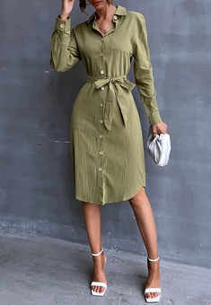 The EMES SHOP shirt dress is detailed with gorgeous contrast colored buttons that add flair to this dress. Features a collar. long sleeves. waist belt. front pocket. relaxed fit. and knee length. Style it with a fedora hat and heels for a showstopper look.MATERIAL:100% Soft Poly MEASUREMENTS:Dress Length is 43"-45"in Small | Bust: 37"-39"in & Waist: 34"-36"in Medium | Bust: 39"-41"in & Waist: 36"-38"in Large | Bust: 41"-43"in & Waist: 38"-40"in Long Sleeve Belted Cuffs Shirt Dress For Fall, Chic Long-sleeve Shirt Dress With Belted Cuffs, Chic Long Sleeve Shirt Dress With Belted Cuffs, Long Sleeve Belted Dress For Daywear, Long Sleeve Belted Dress With Belted Cuffs For Daywear, Collared Shirt Dress With Buttoned Pockets For Day Out, Fall Belted Shirt Dress With Spread Collar, Fall Collared Belted Dress With Belted Cuffs, Office Long Sleeve Shirt Dress With Pockets