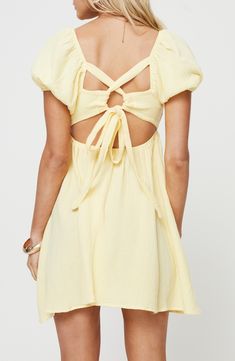 Gauzy cotton keeps you cool in a playful babydoll dress that ties at the back and features puff short sleeves. Ties at back Square neck Short sleeves Lined 100% cotton Hand wash, line dry Imported Let's Dance, Fleece Dress, Sweatshirt Set, Outerwear Outfit, Dress Yellow, Loungewear Sets, Curve Dresses, Casual Tank Tops, Tops Fall