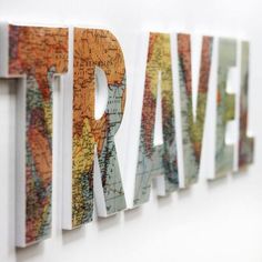 the word travel is made out of maps