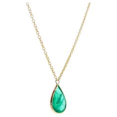 This necklace features a pear-cut green emerald with a weight of 1.91 carats, set in 14k yellow gold (YG). Emeralds are highly prized for their rich green color, and the pear cut, with its distinctive teardrop shape, adds an elegant and unique touch to the gemstone. Necklaces with emeralds are often chosen for their beauty and the lush green hue that emeralds are known for. The pear cut can create a graceful and stylish look for the necklace. Pear Shape Fashion, Shape Fashion, Gemstone Necklaces, Rich Green, Green Emerald, Lush Green, Pear Cut, Pear Shape, Pear Shaped