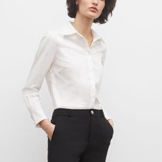 Intricate Pointelle Stitches Elevate A Classic Button-Down Shirt. This Slim-Fit Signature Is Designed To Be Your Wardrobe’s Workhorse, Pairing With Nearly Every Pant You Own, Now And In The Future. Model Is 5’10.5” Wearing A Size S Designed For A Sleek, Softly Tapered Fit That’s Just Right For Tucking. 96% Cotton; 4% Elastane Slim Fit With A 25¾” Length; Based On A Size M Front Button Placket Spread Collar; Long Sleeves With Single-Button Barrel Cuffs; Back Shoulder Yoke; Pointelle-Stitched Trim Timeless Button-up Blouse For Business Casual, Slim Fit Buttoned Office Blouse, Slim Fit Button-up Top For Work, Office Slim Fit Blouse With Buttons, Slim Fit Office Blouse With Buttons, Slim Fit Button Blouse For Office, Slim Fit Button-up Tops For Business Casual, Timeless Business Casual Tops With Button Cuffs, Timeless Workwear Shirt