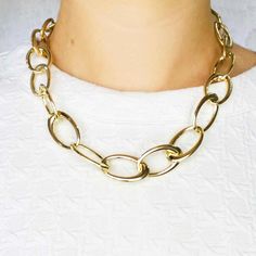 This 18 inch 14k yellow gold chain necklace has a large oval lobster clasp that is fashionable and easy to use! Large lobster clasps are the best clasps for chain necklaces, they make the chain appear seamless and allow the wearer a secure and easy way to put on and remove the necklace. The links are 17 millimeters wide with an open oval design. The chain link necklace is 18 inches long and weighs 34 grams. Chic Formal Chain Necklace With Lobster Clasp, Elegant Oval Chain Necklace With Lobster Clasp, Classic Chunky Oval Link Chain Necklace, Classic Chunky Chain Necklace With Oval Links, Classic Gold Chain Necklace With Oval Pendant, Formal Gold Chain Necklace With Oval Pendant, Formal Oval Pendant Gold Chain Necklace, Formal Chunky Chain Necklace With Oval Links, Classic Oval Chain Necklace With Lobster Clasp