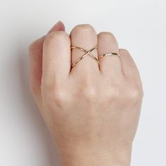 Criss Cross Ring, X Ring, 14k Solid Gold Minimalist Cross Ring, Celebrity Ring, 14k Solid Gold Layering Ring, Stacking Ring, Stackable Ring ≫ Product Details ◈ Handmade / Handcrafted Fine Jewelry ◈ Total Weight: 1.8 ~ 2.0 g ◈ Metal: Solid 14K Gold (18K also available - Additional fees may apply) ◈ Gold Color: White gold, Rose gold, Yellow gold ◈ The height from the bottom of the x to the top of the x is approximately 14 ~ 15mm. The ring will be approximately 22 ~ 23mm tall when the ring is flipp Delicate 14k Gold Open Band Midi Rings, Minimalist 14k White Gold Bypass Ring, 14k Gold Minimalist Couple Rings With Open Design, 14k Gold Minimalist Open Couple Rings, Minimalist 14k Gold Couple Rings With Open Design, Minimalist Infinity Stackable Rings, Minimalist Rose Gold Infinity Ring, Fine Jewelry Midi Rings With Open Band, Dainty 14k Gold Bypass Ring