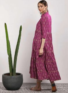 Pink printed Anarkali kurta Dress has a shirt collar, three-quarter sleeves, flared hem Material: Cotton Sizes: To Fit Bust(in inches): XS(32), S(34), M(36), L(38), XL(40), 2XL(42), 3XL(44) Length: 49 inches Wash Care: Dry Clean Pattern: Floral Print, Hand Block Print Style: Style: Indo Western Outfit For Women, Indowestern Dress, Indian Dress, Kurti For Women, Anarkali Dress Package Contains 1 kurta Dispatch within 7 days Festive Kurta With 3/4 Sleeves, Western Outfit For Women, Indo Western Outfit, Western Dress For Women, Indo Western Outfits For Women, Indo Western Dresses For Women, Printed Anarkali, Kurtas For Women, Outfit For Women