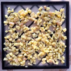 chopped potatoes on a baking sheet ready to be cooked