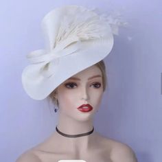 It's Stylish,Gorgeous And Unique! Check Out Our Off White/Cream Fascinator For Your Next Tea Party. Ready To Wear Now. Not Diy. **Available To Ship Now. Fitted Cream Costume Hats For Spring, Cream Mini Hat For Party, Cream Top Hat For Summer, Cream Costume Hats And Headpieces For Church, Chic White Fitted Costume Hats And Headpieces, Fitted Cream Top Hat For Summer, Cream Fitted Top Hat For Summer, Fitted Cream Mini Hats For Summer, Chic Fitted White Mini Hat