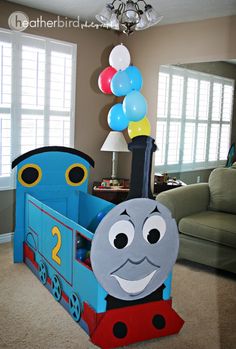 a thomas the tank engine bed in a living room