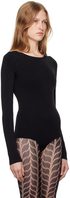 Stretch Q-NOVA® recycled nylon jersey bodysuit. · Round neck · Press-stud fastening at bottom Supplier color: Black Black Elastane Bodysuit With Minimal Stretch, Black Bodysuit With Minimal Stretch, Black Nylon Bodysuit With Scoop Neck, Black Nylon Scoop Neck Bodysuit, Black Second-skin Turtleneck Bodysuit, Compressive Black Seamless Leotard, Compressive Black Nylon Bodysuit, Black Stretch Full-length Stockings, Backless Bodysuit