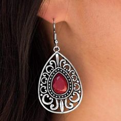 Swirls of silver filigree create an airy teardrop-shaped frame that wraps around a faceted teardrop bead tinted in red. Earring attaches to a standard fishhook fitting. Sold as one pair of earrings. Lead and Nickel Free. Red Dangle Filigree Jewelry, Red Filigree Dangle Jewelry, Red Elegant Nickel-free Teardrop Earrings, Red Nickel-free Teardrop Earrings, Red Teardrop Pierced Jewelry, Nickel Free Red Teardrop Earrings, Nickel-free Red Teardrop Earrings, Bohemian Red Teardrop Jewelry, Teardrop Jewelry With French Hook For Party