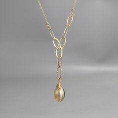 A wonderfully unique chain link necklace for everyday wear! This long gold filled necklace features a pendant with two gemstones - it's reversible, so you can choose your favorite colors and mix and match it with all your favorite outfits. One side is set with rutile quartz in sterling silver bezel and the other side is up to you (choose from the gemstone options in the drop down menu)! Delicate and super elegant with a bohemian chic twist, it's the perfect necklace to wear day or night. The lin Gold Necklaces With Gemstones In Recycled Gold, Gold Gemstone Necklace With Recycled Gold, Gold Gemstone Necklace In Recycled Gold, Gold Necklace With Oval Link Gemstone, Luxury Teardrop Gold Chain Jewelry Gift, Gold Necklaces With Gemstones In 14k Gold Filled, Gold Oval Link Gemstone Jewelry, Unique Gold Necklaces For Everyday Wear, Unique Gold Teardrop Pendant Jewelry