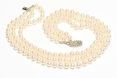 Buccellati Pearl Diamond Necklace. Vintage Mario Buccellati 18K gold and diamond clasp 3 strand pearl necklace. Indulge in the timeless elegance and exquisite craftsmanship of the Buccellati pearl and diamond gold necklace. This luxurious piece showcases the perfect harmony between classic beauty and modern sophistication. Signed Mario Buccellati Italy 750. Features: Material: 18K Gold Gemstones: High-quality pearls and dazzling diamonds Design: Intricately handcrafted with Buccellati's signatur Luxury Pearl Necklace With 17 Jewels, Luxury Akoya Pearl Necklace For Evening, Classic Akoya Pearl Necklace For Evening, Classic Pearl Diamond Necklace For Formal Occasions, Classic Formal Pearl Diamond Necklace, Luxury Double Strand Pearl Necklace For Formal Occasions, Classic Diamond Necklace With Pearl Chain For Formal Events, Luxury Multi-strand Pearl Necklace For Wedding, Formal Double Strand Pearl Necklace With Pendant