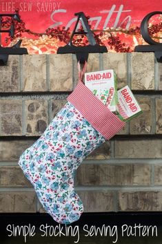 a christmas stocking hanging from a brick wall with the words simple sewing pattern on it