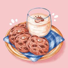 some cookies on a plate with a glass of milk