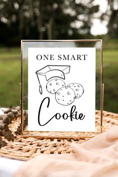 a sign that says one smart cookie on it next to some nuts and other things