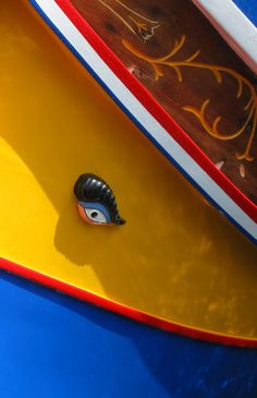 a close up of a surfboard with an eye on it