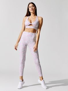 Look cute and fit in this Power Flower Set, featuring a cutout sports bra and high waisted leggings. Spring Workout Activewear With Built-in Bra, Fitted Sports Bra For Yoga And Spring, Sleeveless Activewear For Pilates In Spring, Stretch Sports Bra For Pilates In Spring, High Stretch Sports Bra For Light Exercise In Spring, Spring Athleisure Activewear With Built-in Bra, Fitted Leggings For Light Exercise In Spring, Spring Yoga Sports Bra, Bra-friendly, Athleisure Sports Bra For Gym