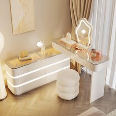 a room with a desk, mirror and stools in the middle is lit up by lights