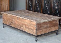 an old wooden box sitting on top of a floor