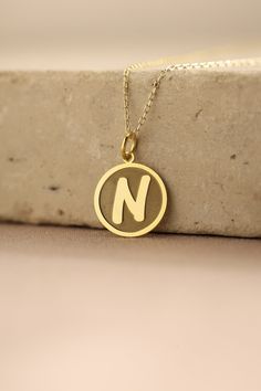 Gold Initial Pendant - Initial Gold Necklace ● Material of pendant: Solid Gold 14k ( REAL GOLD ) ● Metal Stamp: 14k ( REAL GOLD ) ● The pendant is available in 5 sizes: - 12,7 mm / 0.5 inches (Diameter) - 14,0 mm / 0,55 inches ( Diameter ) In the photos - 15,3 mm / 0.6 inches ( Diameter ) - 16,5 mm / 0,65 inches ( Diameter ) - 19,1 mm / 0,75 inches ( Diameter ) ( In the photos the size is 14mm / 0.55 inches Diameter ) ( Jump Ring inner diameter: 4 mm ) ● Material of chain: Solid gold 14k ( REAL Yellow Gold Name Jewelry In Round Shape, Yellow Gold Name Jewelry, Round Shape, Yellow Gold Round Name Jewelry, Yellow Gold Round Pendant Necklace With Name, Yellow Gold Round Jewelry With Name, 14k Gold Name Necklace With Round Shape, 14k Gold Round Necklace With Name Detail, 14k Gold Round Necklace With Name, 14k Gold Round Pendant Necklace With Hallmarks