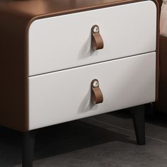 a brown and white dresser with two drawers