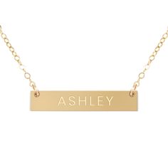 The daintiness of our personalized name necklace adds the perfect touch to any outfit! The simplicity of this custom necklace allows you to mix and match with a variety of styles to create an elegant look. Beautifully engraved, this customized piece makes the perfect gift for Valentine’s Day, Mother’s Day, Christmas and all special occasions and milestones!Material: 14k gold filled, anti-tarnish material (will not turn blue or green and will not stain skin)Bar Size: 1.25” W x 0.25” HChain Length Elegant Customizable Nameplate Charm Necklaces, Customizable Elegant Nameplate Charm Necklaces, Classic Everyday Customizable Necklaces, Classic Everyday Customizable Necklace, Classic Nameplate Necklace For Everyday, Classic Everyday Nameplate Necklace, Simple Personalized Name Necklaces, Customizable Everyday Nameplate Necklace, Everyday Customizable Nameplate Necklace