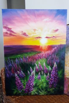 a painting of purple flowers in front of a sunset over a field with lavenders