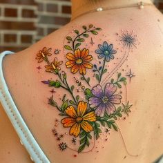 Wildflower Tattoo Artistic Design Cottage Garden Tattoo, Tattoo Artistic, Butterfly Wrist Tattoo, Garden Tattoos, Beginner Tattoos, Wildflower Tattoo, Daisy Tattoo, Tasteful Tattoos, Back Of Shoulder Tattoo