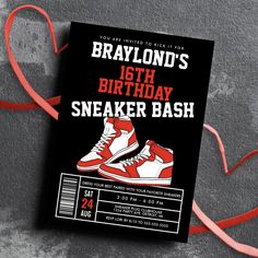 a birthday card with an image of a pair of sneakers on it and a red ribbon