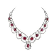 This statement necklace features 46.25 carats of F-H VS-SI pear and round brilliant diamonds, and 42.23 carats of cushion mixed cut red moderately strong rubies set in 18K white and yellow gold. This intricate piece features 23 pear brilliant diamonds and 425 round brilliant diamonds. Made in Italy. Viewings available in our NYC showroom by appointment. Luxury White Gold Ruby Necklace, Luxury White Ruby Necklace, Luxury Ruby Necklace In White Gold, Luxury Diamond White Ruby Bridal Necklace, Luxury Yellow Gold Ruby Bridal Necklace, Latest Necklace Design, Necklaces Luxury, Ruby And Diamond Necklace, Necklace White Gold