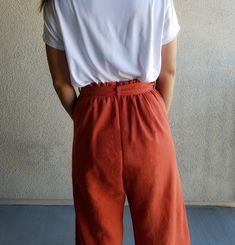 "* Super comfortable wide-leg pants, they are like hidden pajamas! * This fabric is soft like butter and it doesn't wrinkle much, so no ironing is needed, which means more time for you! * High waisted with an elastic band, for extra comfort. * Paper bag waist * You can wear them with and without the tie * Two big pockets * Lengthen or shorten up to 15cm / 6in at no extra cost, just let me know in the comments. | SIZES | Please check the measurements carefully. All fabrics are pre-washed and drie Versatile High-waisted Culottes With Relaxed Fit, Versatile High-waisted Relaxed Fit Culottes, High-waisted Relaxed Fit Cotton Culottes, Relaxed Fit Linen Wide Leg Pants For Day Out, Summer Cotton Wide-leg Culottes, Loungewear Wide Leg Pants With Tie Waist, Wide Leg Pants With Tie Waist For Loungewear, Cotton Culottes With Elastic Waistband, Casual Wide Leg Pants With Tie Waist