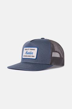 The Quality Trucker Hat features a custom patch reminiscent of license plates in Hawaii, the hat is made from cotton canvas with a polyester mesh back and snapback closure. Cotton canvas front, Polyester mesh back Katin embroidered patch 5-panel trucker hat Mid-crown structured fit Contrast stitch Snapback closure | Quality Trucker Hat Cotton in Indigo by Katin Custom Patch, Custom Patches, Fleece Shorts, Basic Shirts, License Plates, Surf Shop, Embroidered Patch, Contrast Stitch, Embroidered Patches