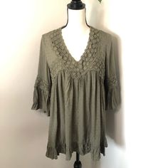 New Embroidered Eyelet Bell Sleeve Mini Dress By Tantrums. Olive Green Color. 3/4 Sleeve. Embroidered Trim. Mini Length (Could Be Worn As A Longer Shirt). V-Neck. Size M. Approx Measurements: Length (28 In), Armpit To Armpit (22 In). Excellent Condition. New With Tags. Green Floral Embroidered Tunic For Spring, Rayon Dresses With 3/4 Sleeves For Spring, Summer Lace Dress With 3/4 Sleeves, Summer 3/4 Sleeve Lace Dress, Casual Embroidered Dress With 3/4 Sleeves, Summer Dress With Lace Trim And 3/4 Sleeves, Spring Green Mini Dress With 3/4 Sleeves, Bohemian Mini Length V-neck Dress, Spring Bell Sleeve Embroidered Dress