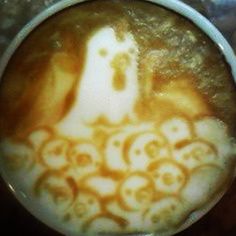 a cappuccino with an image of a ghost on it