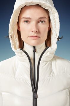 Designed as a mid-layer, this padded hoodie is best when worn under heavier jackets. Crafted from stretch polar fleece, the zip-up style is enhanced with a down-filled front. The nylon laqué front and hood are paired with water resistant zippers, enabling the sweatshirt to double as outerwear in milder weather. Functional Nylon Puffer Jacket With Drawstring Hood, Sporty Nylon Puffer Jacket With Double-lined Hood, Outdoor Nylon Hoodie With Detachable Hood, Technical Nylon Hooded Jacket, Technical Nylon Outerwear With Drawstring Hood, Functional Windproof Nylon Hoodie, Sporty Puffer Jacket With Drawstring Hood For Outdoor, Technical Hooded Nylon Outerwear, Technical Nylon Hooded Outerwear