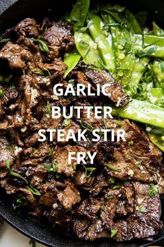 garlic butter steak fry in a skillet with green vegetables