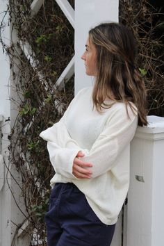 Introducing the Emmerson Sweater - the perfect blend of light-weight comfort and effortless style. Its cream color gives off a beachy vibe, making it the perfect addition to any casual outfit. Let this sweater be your go-to for a relaxed and chic look. How to style: Layer over our Paisley slip dress or style with your favorite Linen shorts for a beachy outfit. About the product Light-weight material, perfect beachy vibes! Boat neckline Relaxed fit 80% Polyester, 20% Acrylic Layering Outfits Fall, Beachy Outfit, Autumn School Outfit, Beachy Vibes, High School Outfit, Early Fall Outfit, Perfect Wardrobe, Fall Street Style, Boat Neckline