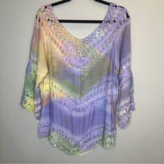 Nwot Soft Surroundings Lulu Tunic Crochet Top Size S Rainbow Tie Dye Soft Surroundings Lulu Tunic Top Crocheted Details Double V-Neckline V-Bottom Trim Beautiful Pastel Multi-Colored This Top Can Be Worn In Many Ways! As A Comfy Beautiful Top With A Tank Under.Off One Shoulder.. As A Cover Up At The Beach And Pool! This Top If Truly Beautiful! Multicolor Crochet Top For Spring Beach Cover-up, Yellow Bohemian Crochet Top For Festival, Yellow Crochet Top With Crochet Trim For Spring, Spring Yellow Crochet Top With Crochet Trim, Yellow Tops With Crochet Trim For Spring, Yellow Bohemian Top With Crochet Trim, Purple Bohemian Crochet Top For Festival, Spring Festival Yellow Crochet Top, Multicolor Crochet Top For Summer Spring