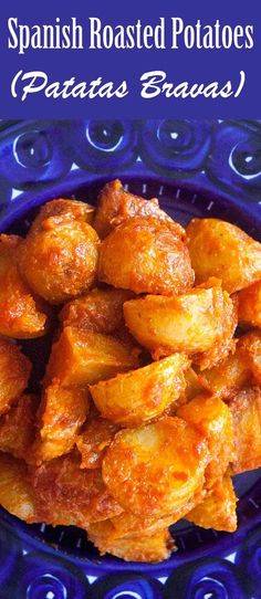 spanish roasted potatoes on a blue plate with text overlay that reads, how to make spanish roasted potatoes