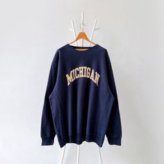 00s University of Michigan sweatshirt/ XL * PLEASE READ BEFORE PURCHASE * PLEASE consider the PHOTOS before making the decision * The images may DIFFER in appearance from the actual product because we took pictures under daylight.  * PLEASE send your PHONE NUMBER after your purchase for the shipping company to contact you X No returns X No refund Condition : 8/10 More details : faded color/ holes/ look at the pictures  Brand : Steve and Barry  Size : XL Pit to pit/ Chests : 27/54 inches  Length Oversized Collegiate Crew Sweater, Oversized Crew Sweater For Campus, Oversized Collegiate Hoodie With Crew Neck, Oversized Fleece Sweats For College, Oversized Crew Neck Sweatshirt For Campus, Oversized Cotton Sweater For Campus, Campus Hoodie Sweatshirt With Letter Print, Letter Print Hoodie Sweatshirt For Campus, Oversized Crew Neck Hoodie For Campus