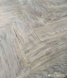 an image of wood flooring that looks like herringbones