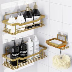 two gold bathroom shelves with soaps, shampoos and lotions on them