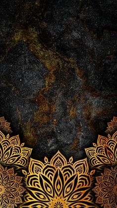 a gold and black background with an intricate design