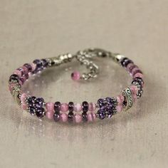 Bracelet bead beaded purple pink bridal czech by AniDesignsllc, $12.95 Pink Bracelet With Extender, Nickel-free Pink Bracelets For Friendship, Nickel-free Pink Jewelry For Friendship, Adjustable Pink Crystal Bracelet For Wedding, Handmade Pink Jewelry For Mother's Day, Spiritual Pink Bracelet As Gift, Handmade Pink Crystal Elegant Bracelet, Adjustable Double Strand Pink Jewelry, Handmade Pink Crystal Bracelet For Wedding