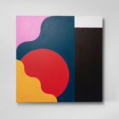 an abstract painting with black, red, yellow and blue colors on a white wall