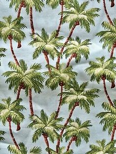 a blue background with palm trees on it