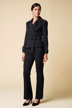 "Cut for a flattering slim-fit, this double breasted black blazer is crafted from a lightweight, luxurious viscose fabric. Complete with a cloverleaf lapel and finished with two-button cuffs - this blazer comes with the option of matching fitted pencil tuxedo pants, to form a womens suit. Jacket: - fitted silhouette - peplum style - cloverleaf lapel - double breasted closure - fabric buttons - matching fabric belt with buckle - fully lined Pants: - high rise - straight style - hook&loop + zi Suit Trousers Women Outfit, Pantsuit Outfit, Trousers Women Outfit, Black Pantsuit, Black Pant Suit, Womens Suit, Woman In Suit, Pant Suits For Women, Below The Knee Dresses